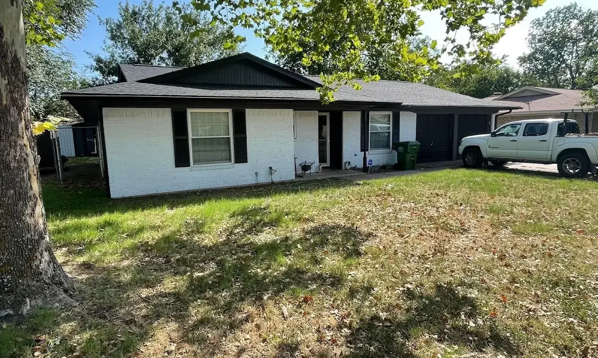 Professional roofing crew working on a residential roof in Wesley Chapel